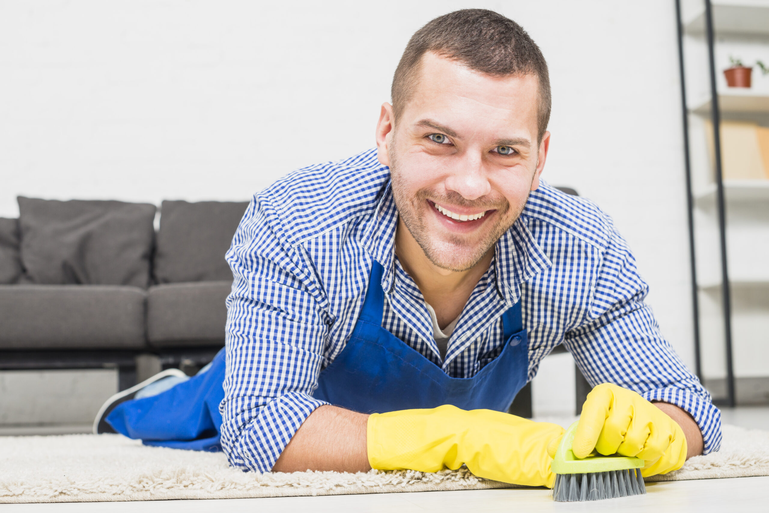 portrait-man-cleaning-his-house
